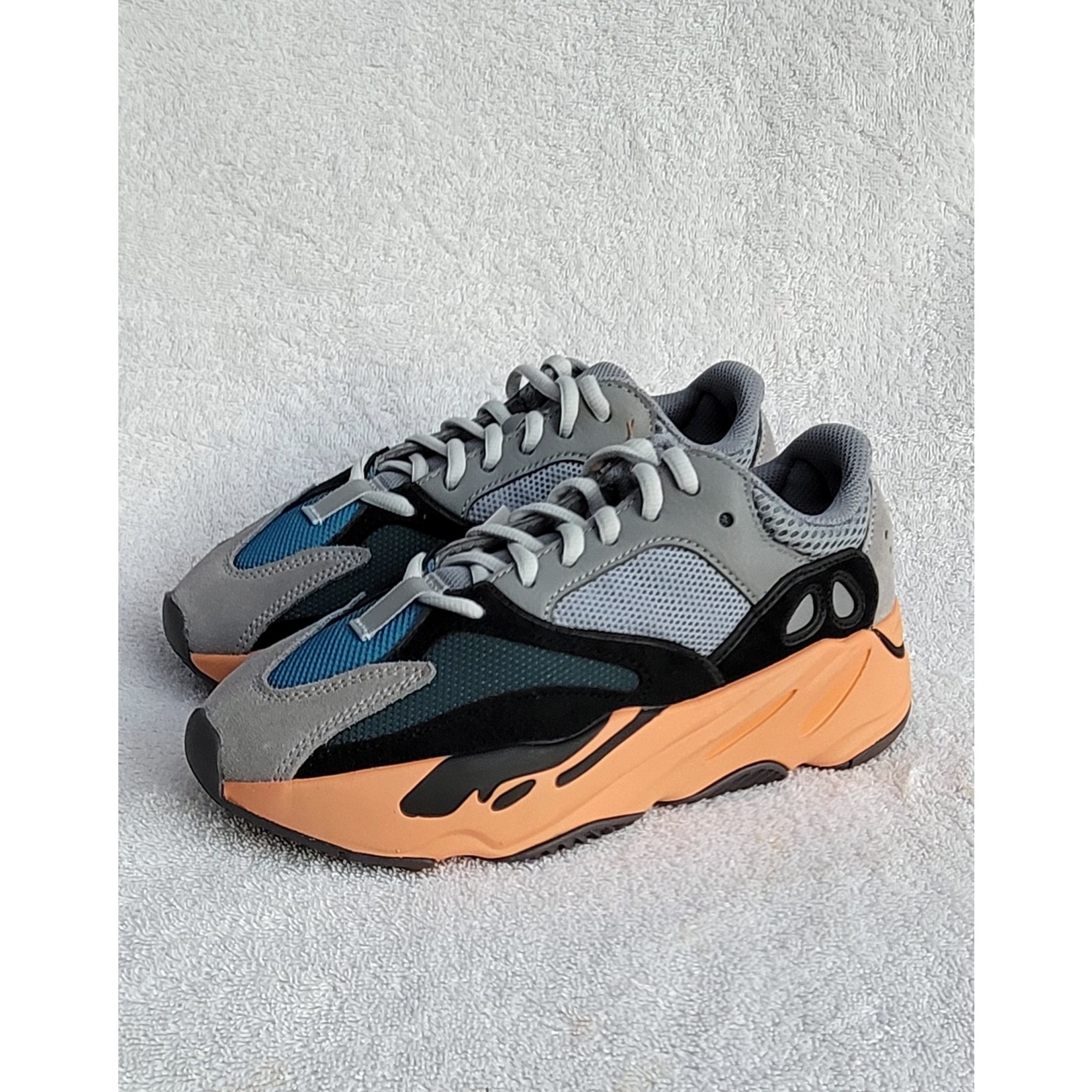 blue and orange yeezy 700