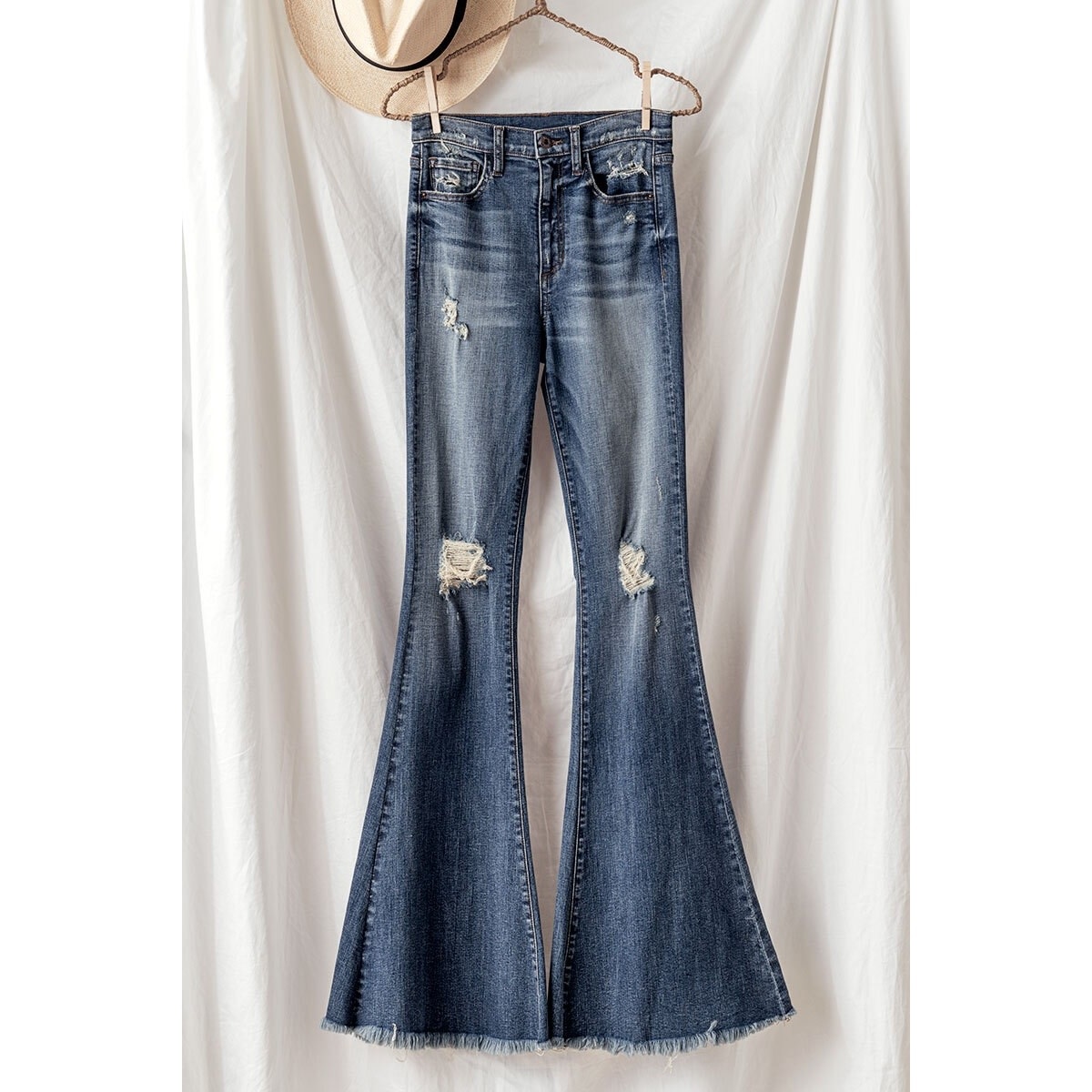 Distressed Ultra Flare Raw Hem Jeans 