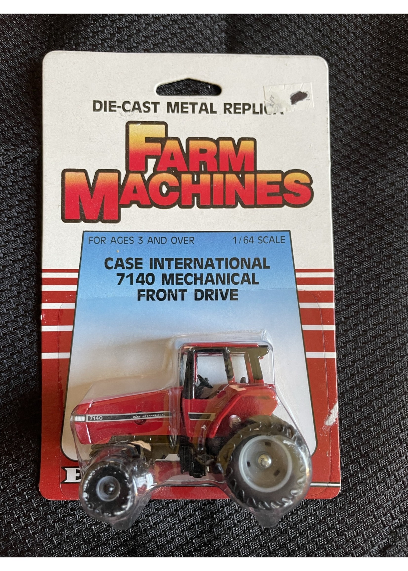 CaseIH 1/64 CaseIH Magnum 7140 MWFD Red/White package