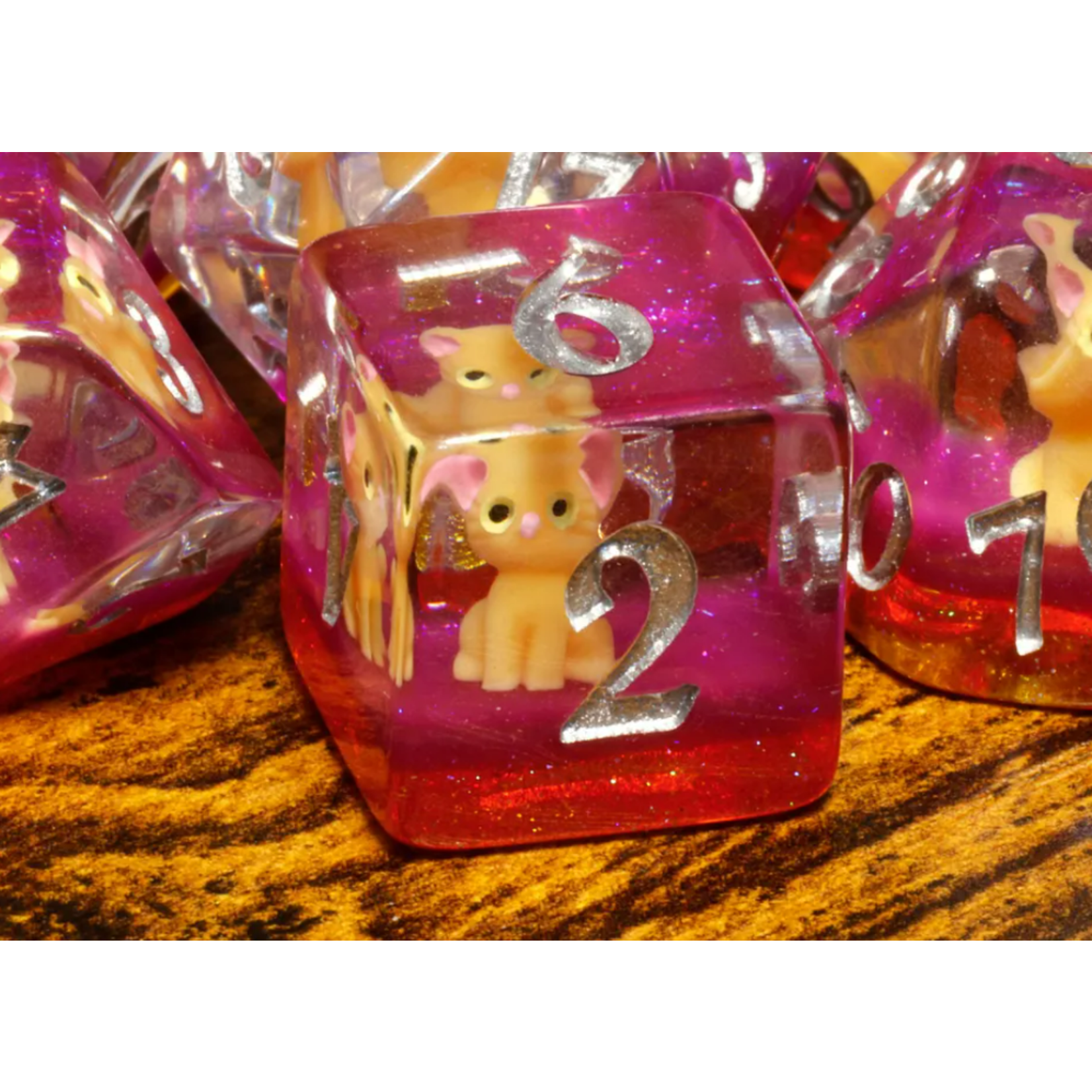 Chat orange - Ensemble de dés polyhédriques par La Voûte du magicien