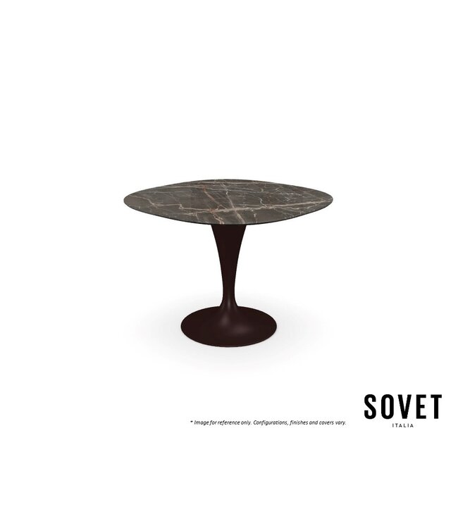 FLUTE SHAPED DINING TABLE.