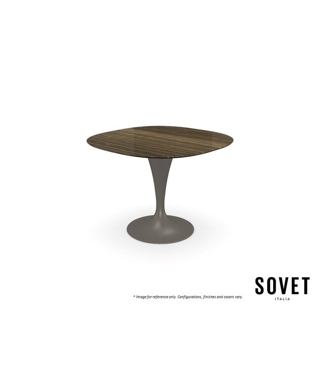 FLUTE SHAPED DINING TABLE.