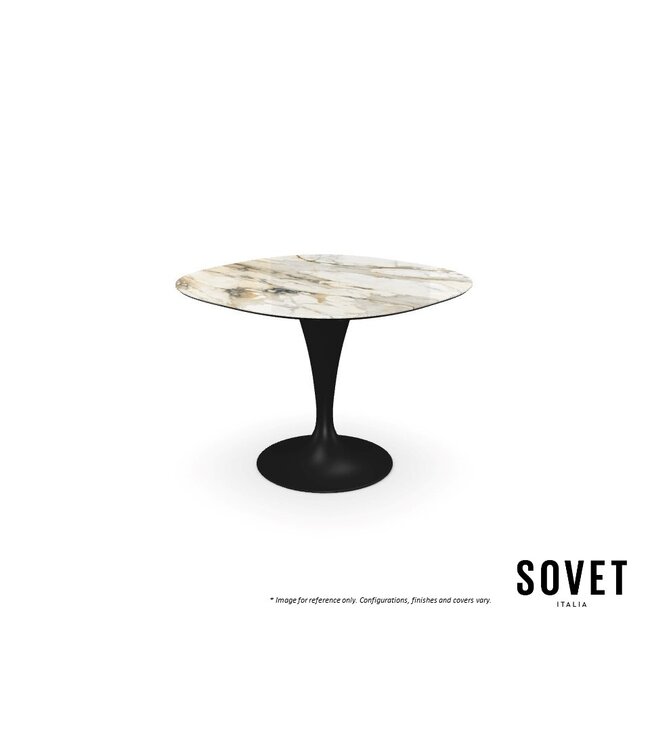 FLUTE SHAPED DINING TABLE.