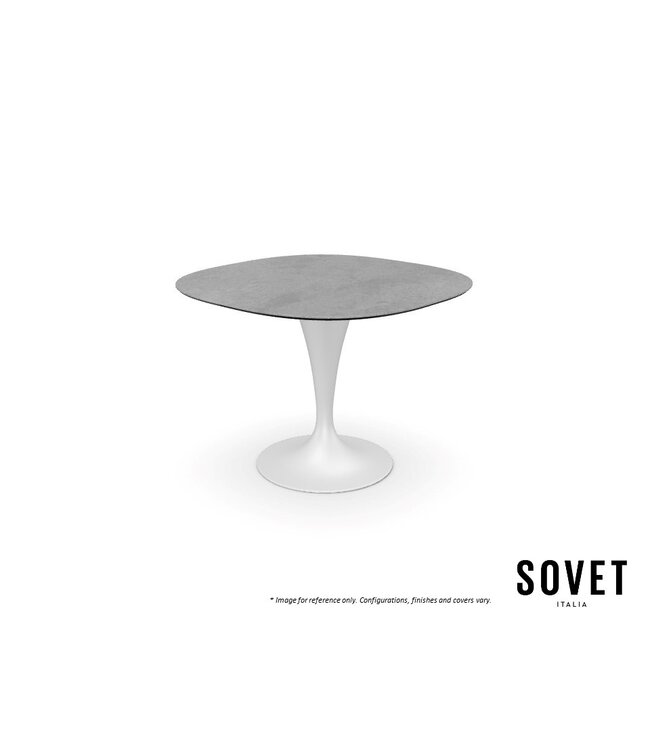 FLUTE SHAPED DINING TABLE.