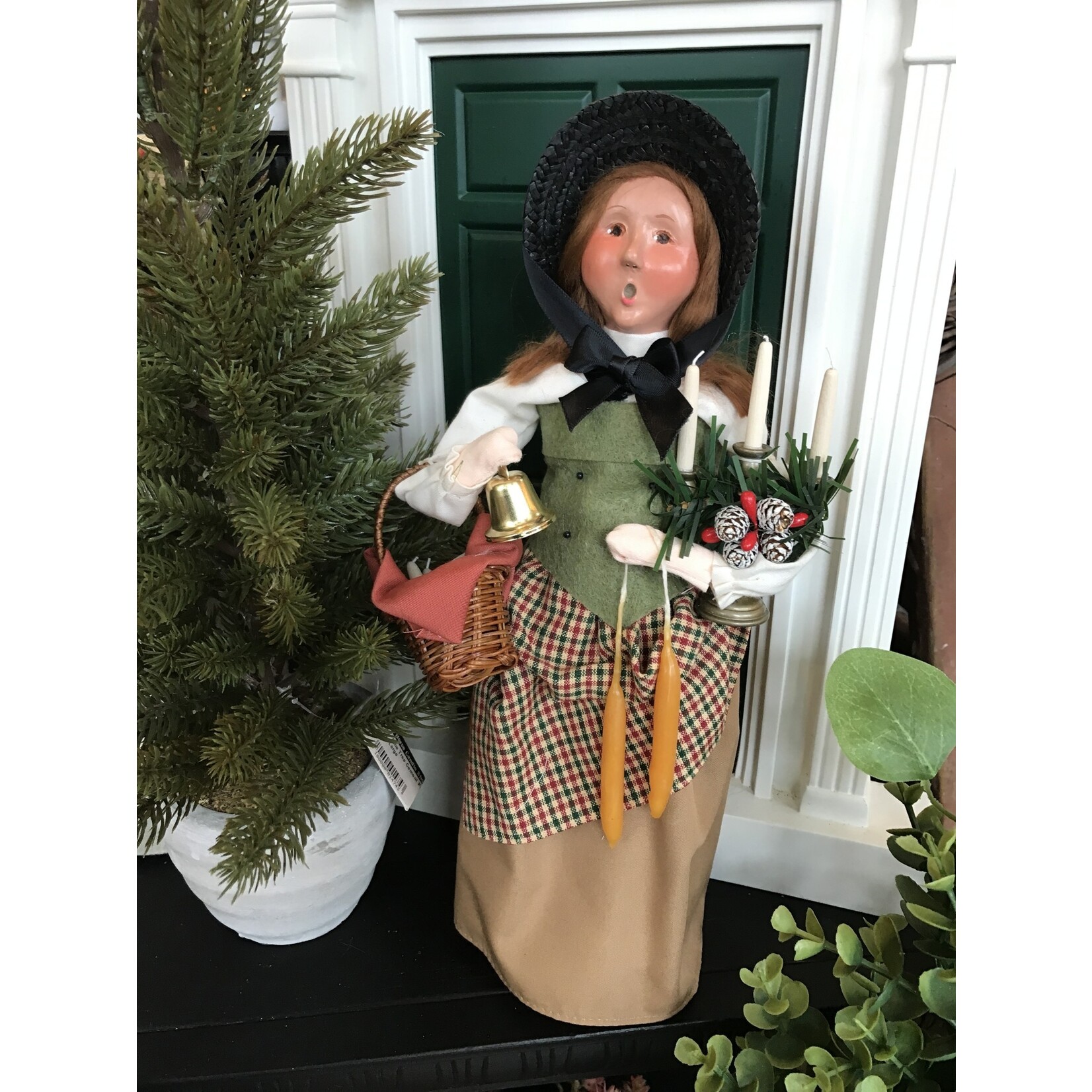 Byers’ Choice Woman  Selling Candles