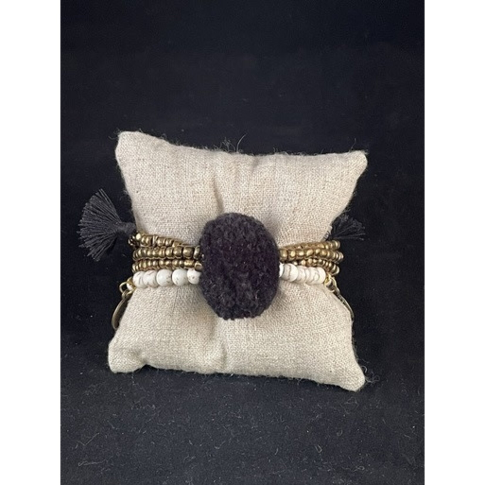 m. lynne designs black big pom bracelet with tassels and coins
