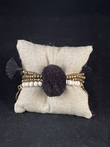 available at m. lynne designs Black Big Pom Bracelet with Tassles and Coins