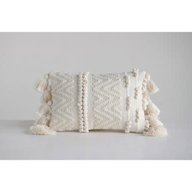 available at m. lynne designs Cream Woven Cotton Textured Pillow with Pom Poms and Tassels