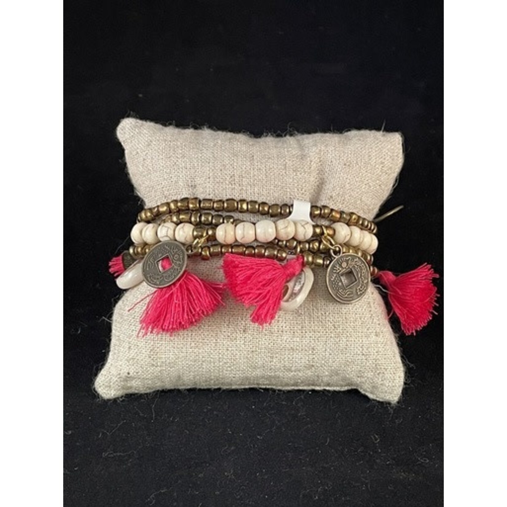 m. lynne designs hot pink big pom bracelet with tassels and coins