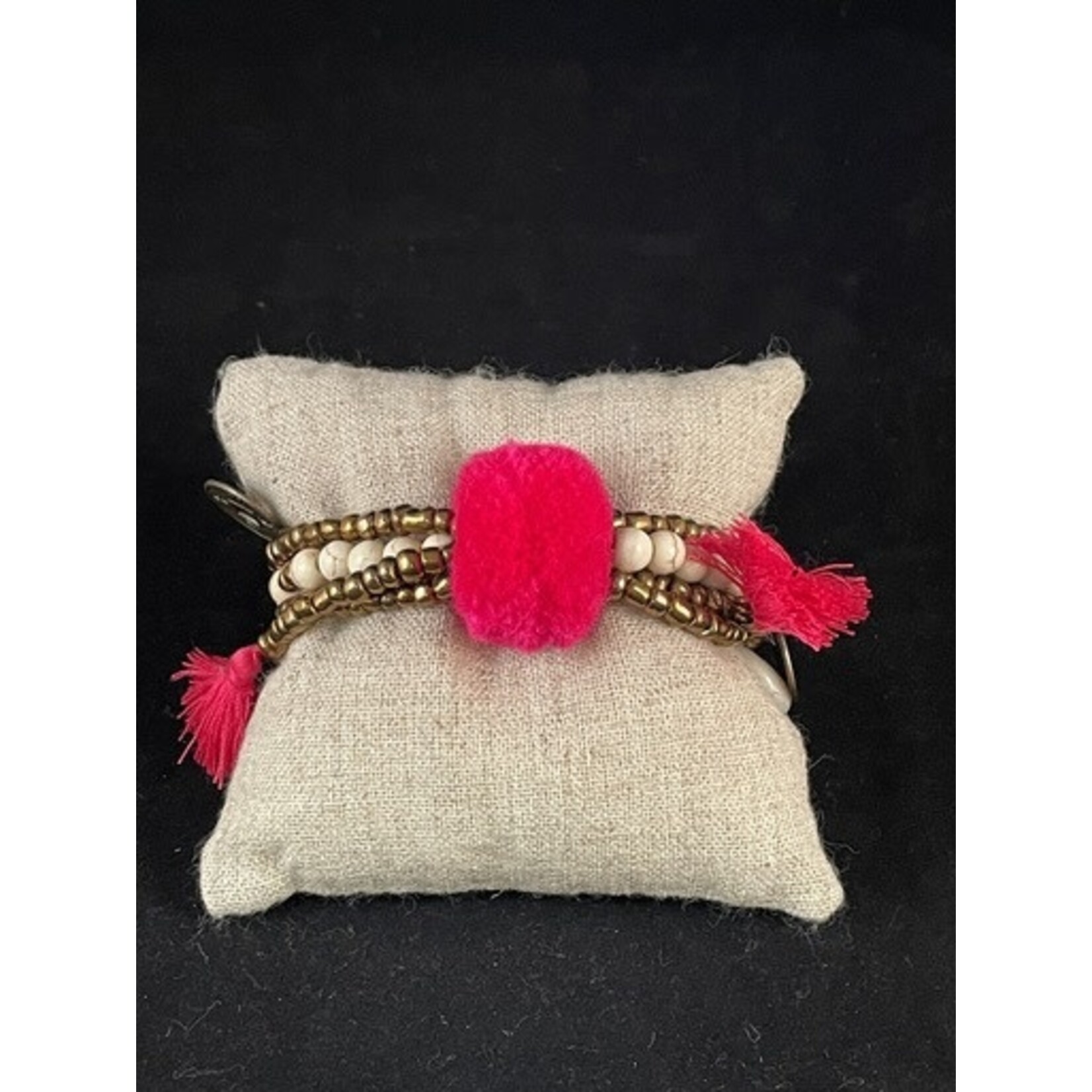 m. lynne designs hot pink big pom bracelet with tassels and coins