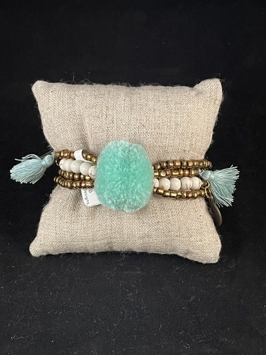 available at m. lynne designs Mint Big Pom Bracelet Tassles and Coins