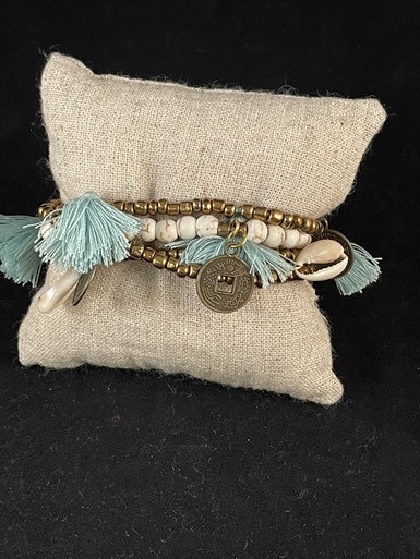 available at m. lynne designs Mint Big Pom Bracelet Tassles and Coins