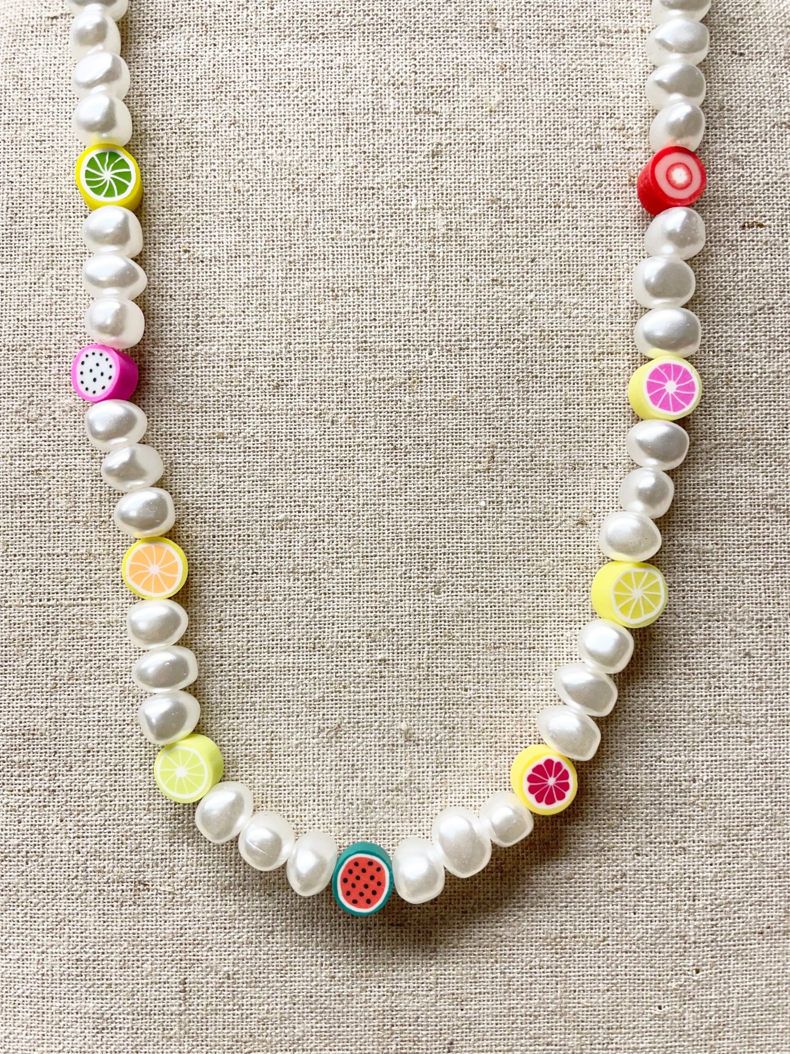 available at m. lynne designs Pearl with Fruit Slices Necklace