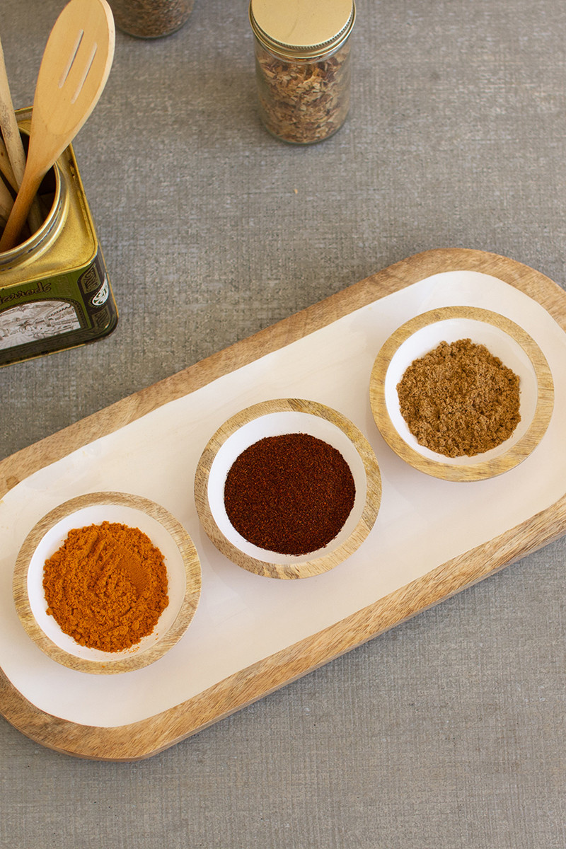 available at m. lynne designs Wooden Serving Tray with White Enamel, Set of Four