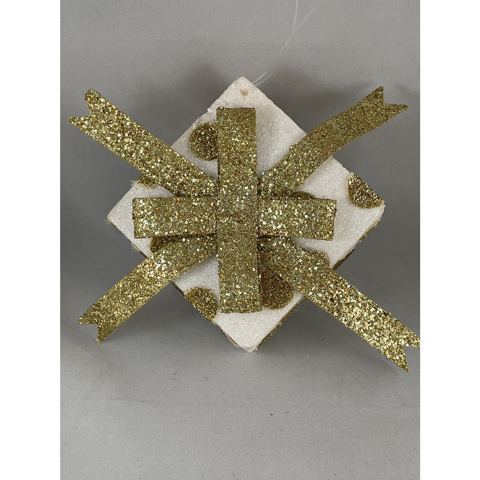 m. lynne designs gold package ornament