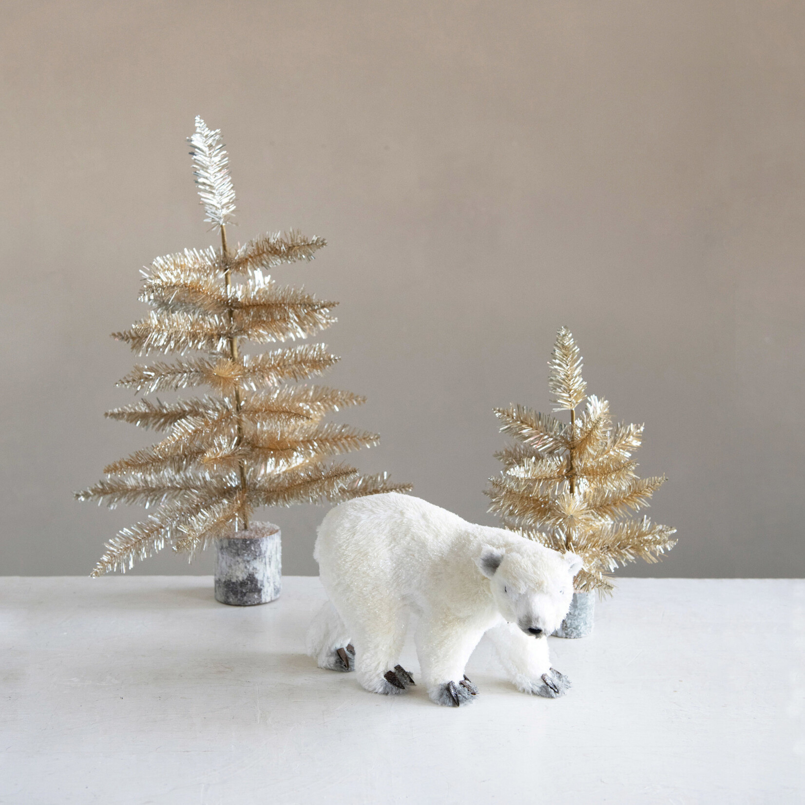 m. lynne designs gold tinsel tree with wood slice base
