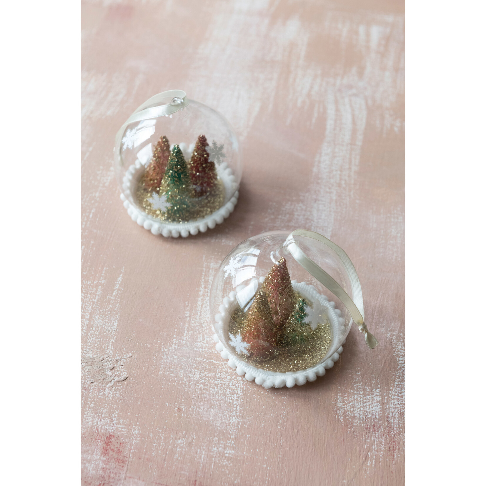 m. lynne designs glass globe ornament with bottlebrush trees