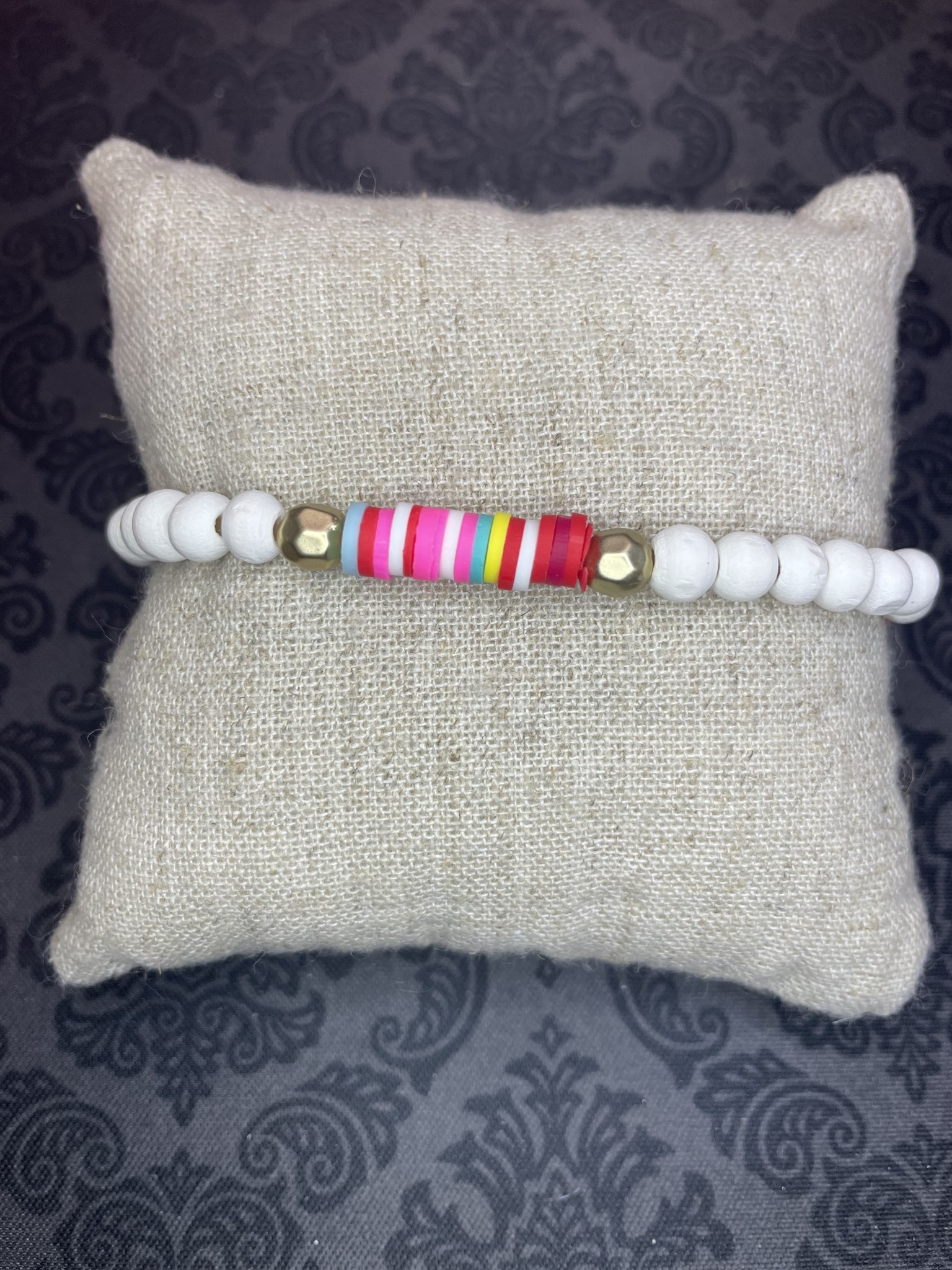 available at m. lynne designs White Bead with Gold Accents and Colorful Slices Bracelet