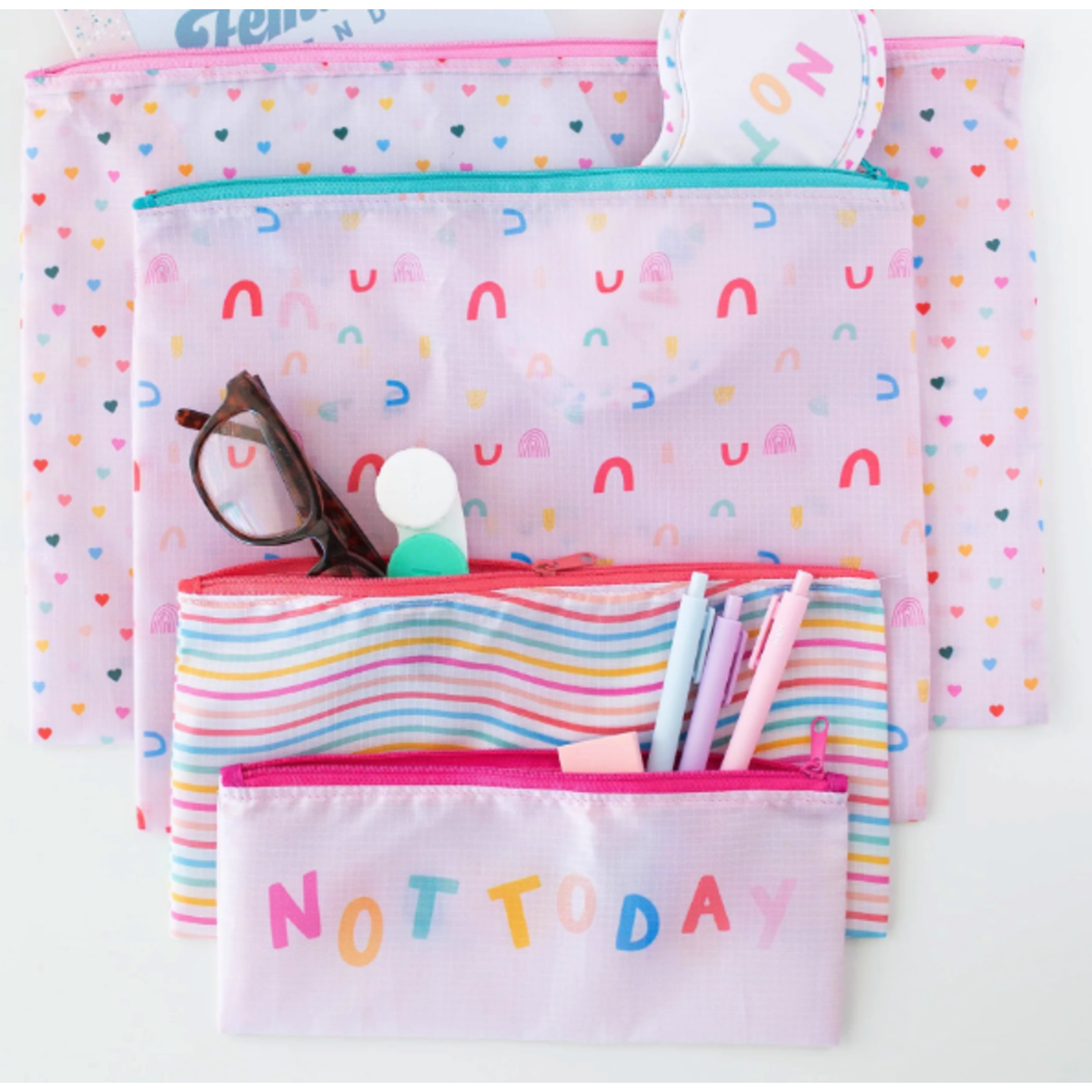 m. lynne designs rainbow pouches