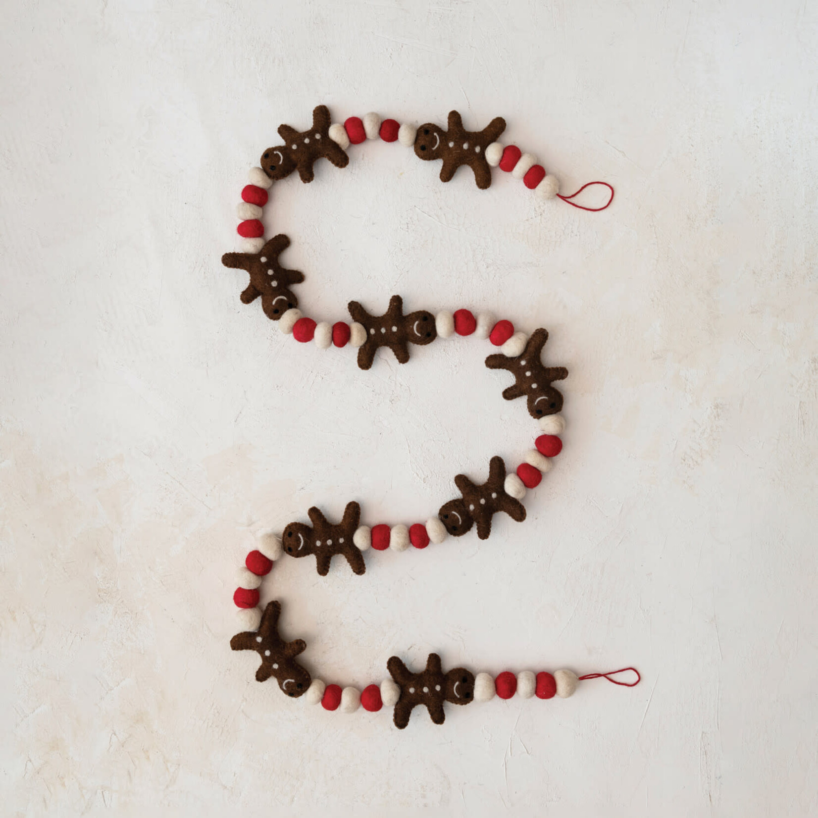 m. lynne designs felt gingerbread men with poms garland