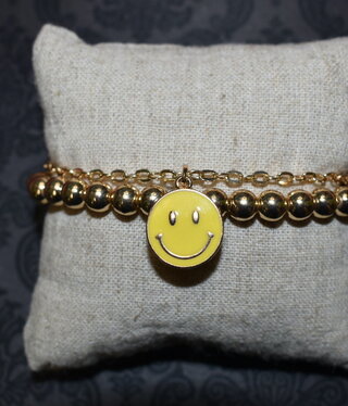 available at m. lynne designs double gold with smiley face bracelet