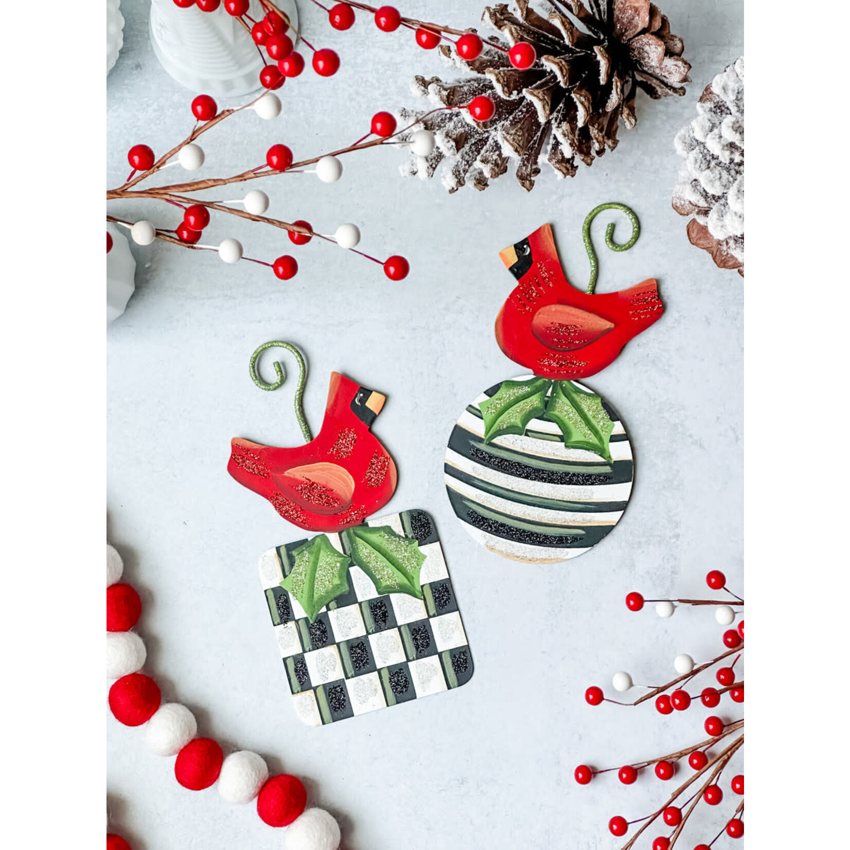 the round top collection cardinal on square ornament