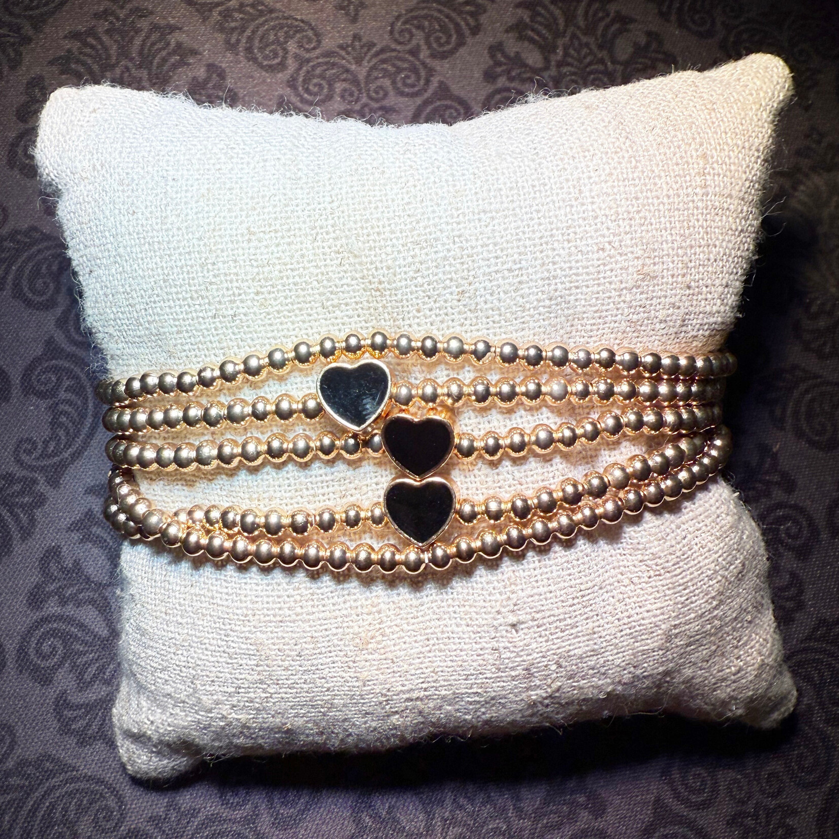 m. lynne designs gold bead bracelet with black hearts