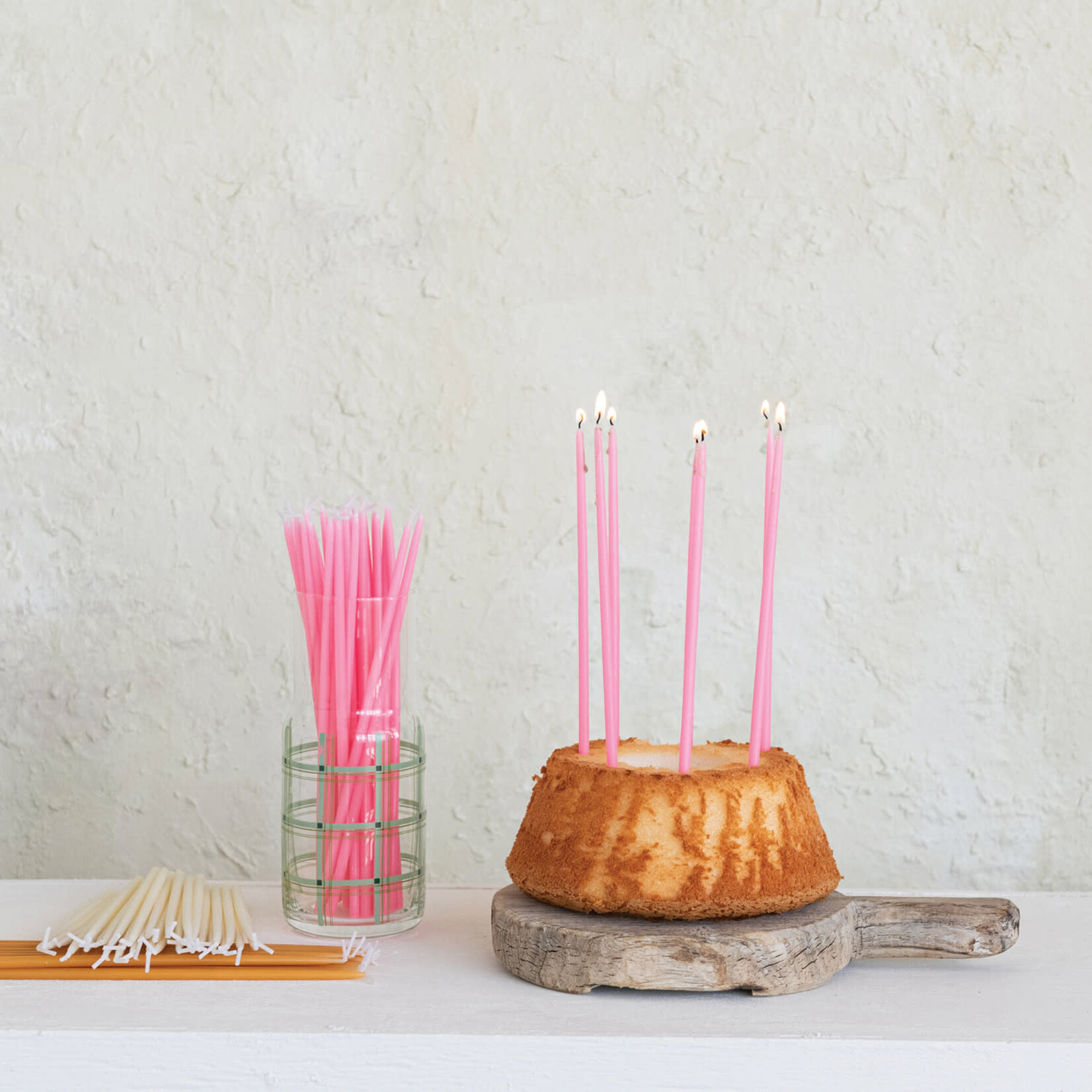 m. lynne designs pink thin taper candles