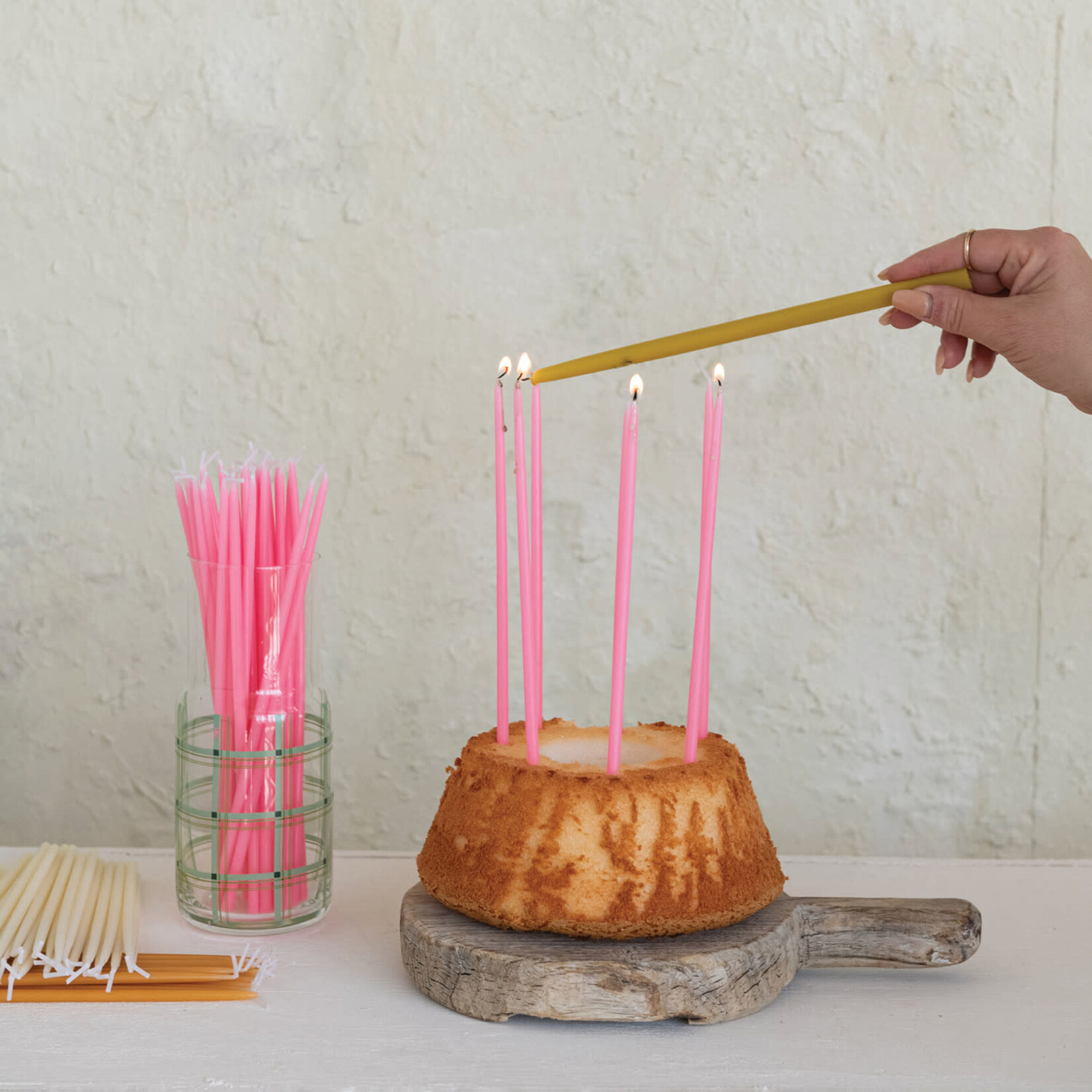 m. lynne designs pink thin taper candles