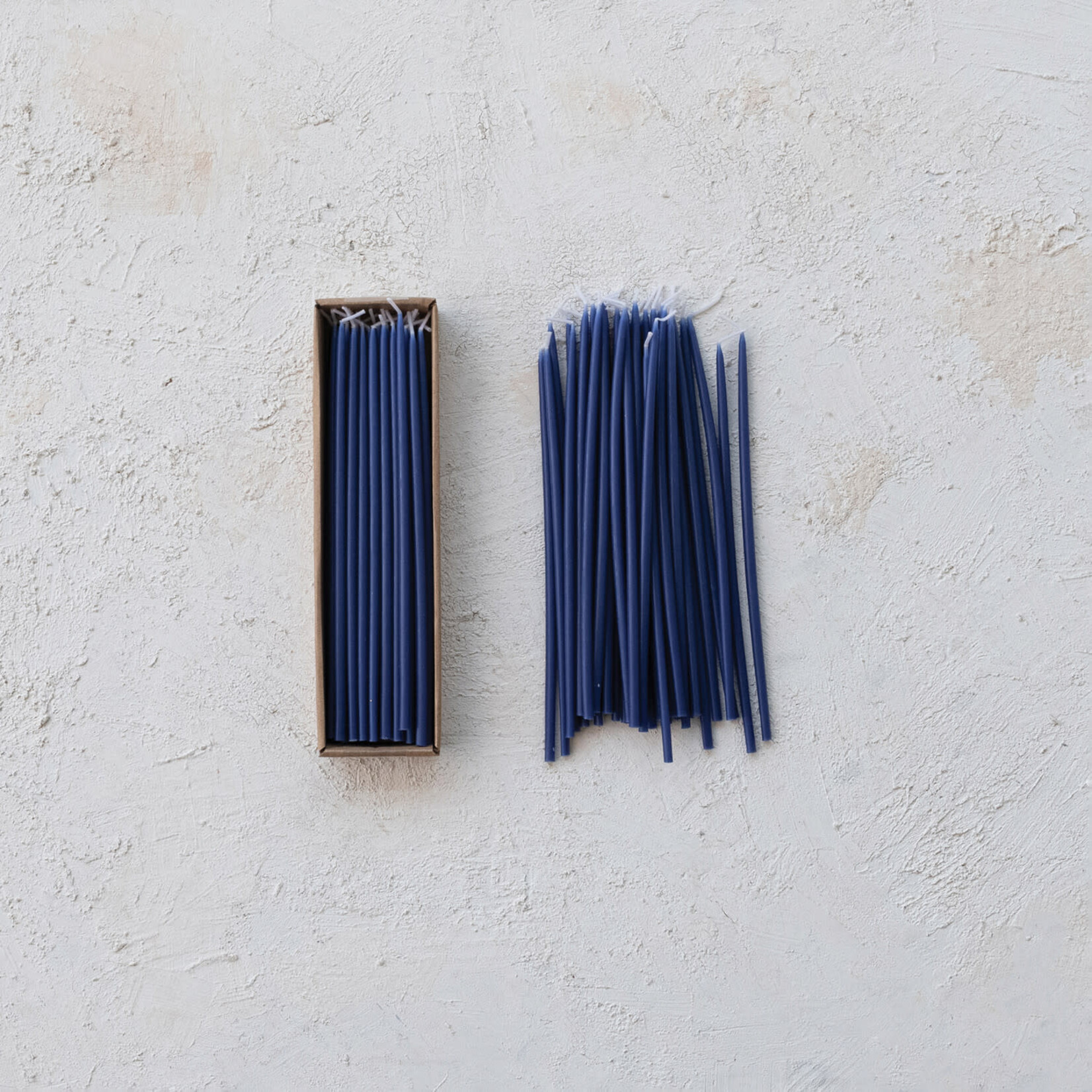m. lynne designs set of 18 navy thin taper candles