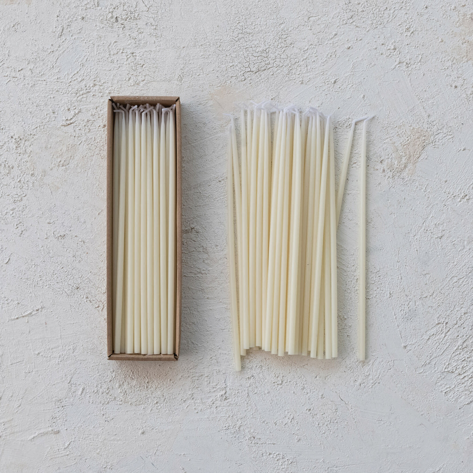 m. lynne designs set of 18 cream thin taper candles