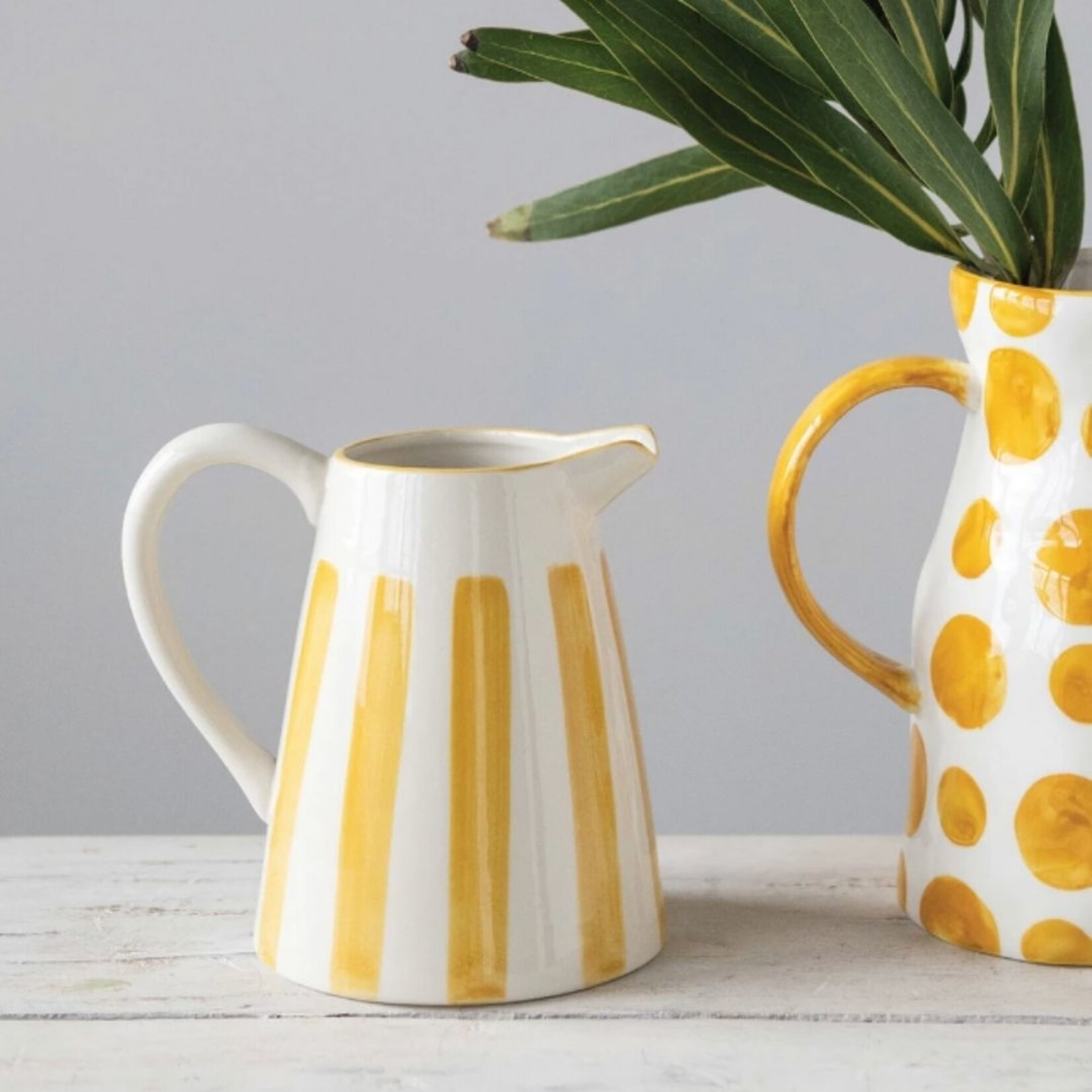 m. lynne designs yellow and white stoneware with stripes pitcher