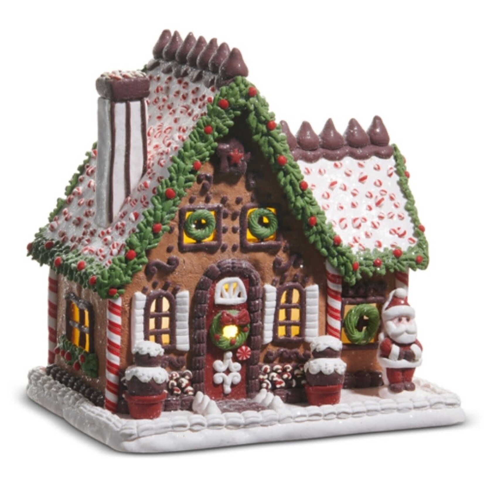 m. lynne designs lighted gingerbread house with chocolate with kisses on roof