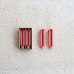 m. lynne designs pink stripe short package shaped taper candle