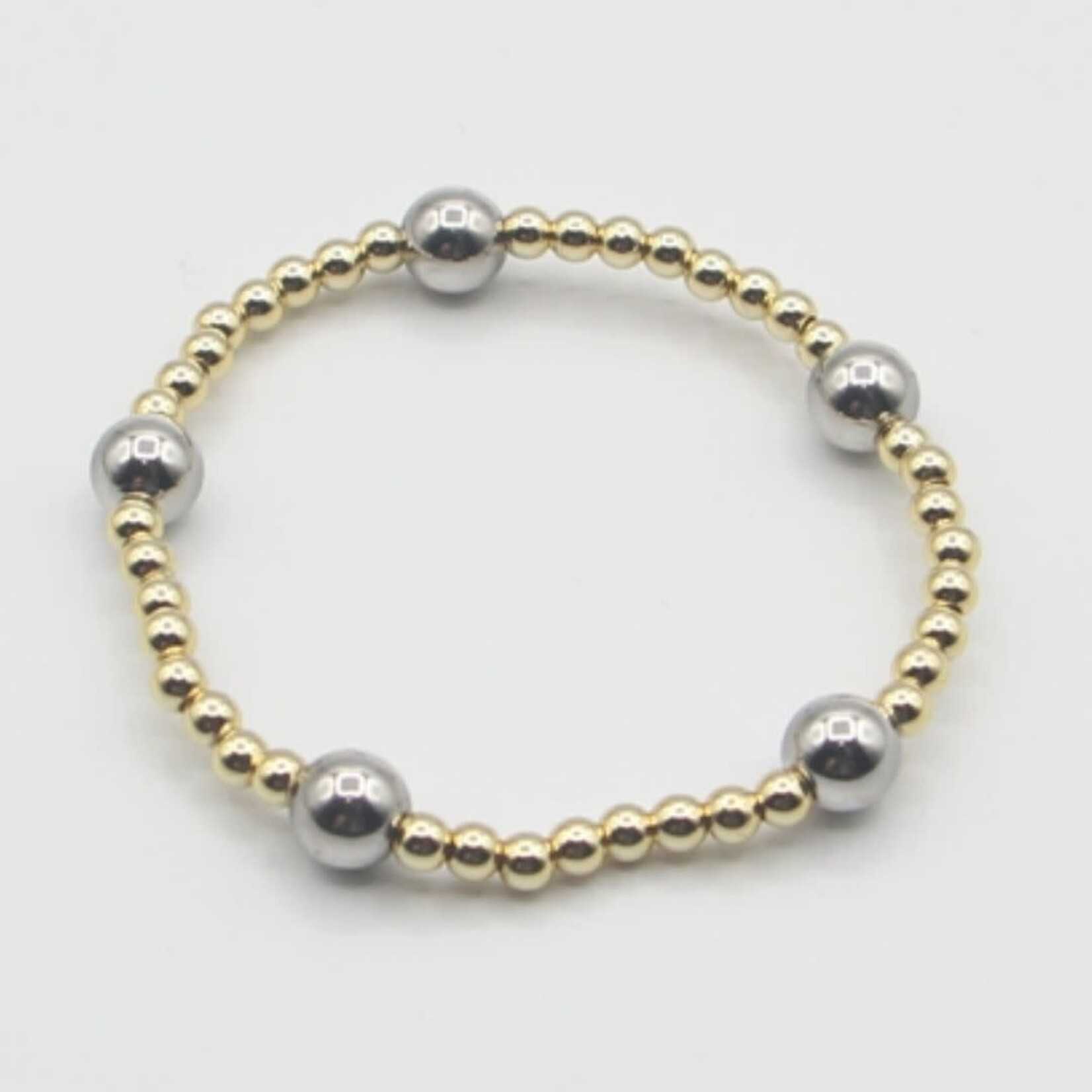 m. lynne designs stainless gold bead bracelet with silver big ball