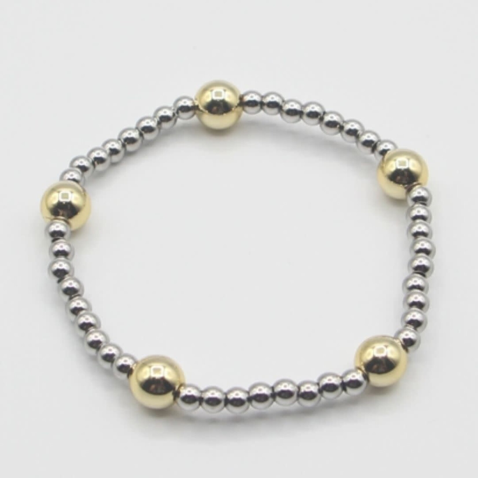 stainless silver bead bracelet with gold big ball