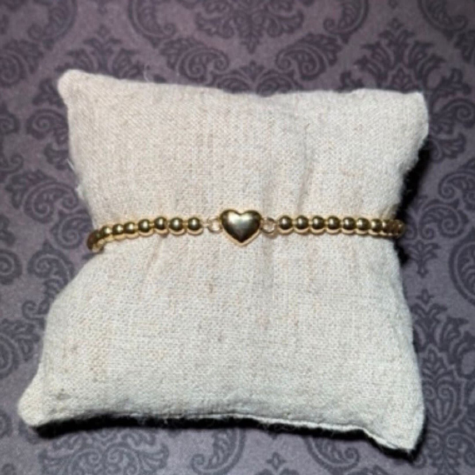 stainless gold bead bracelet with gold heart