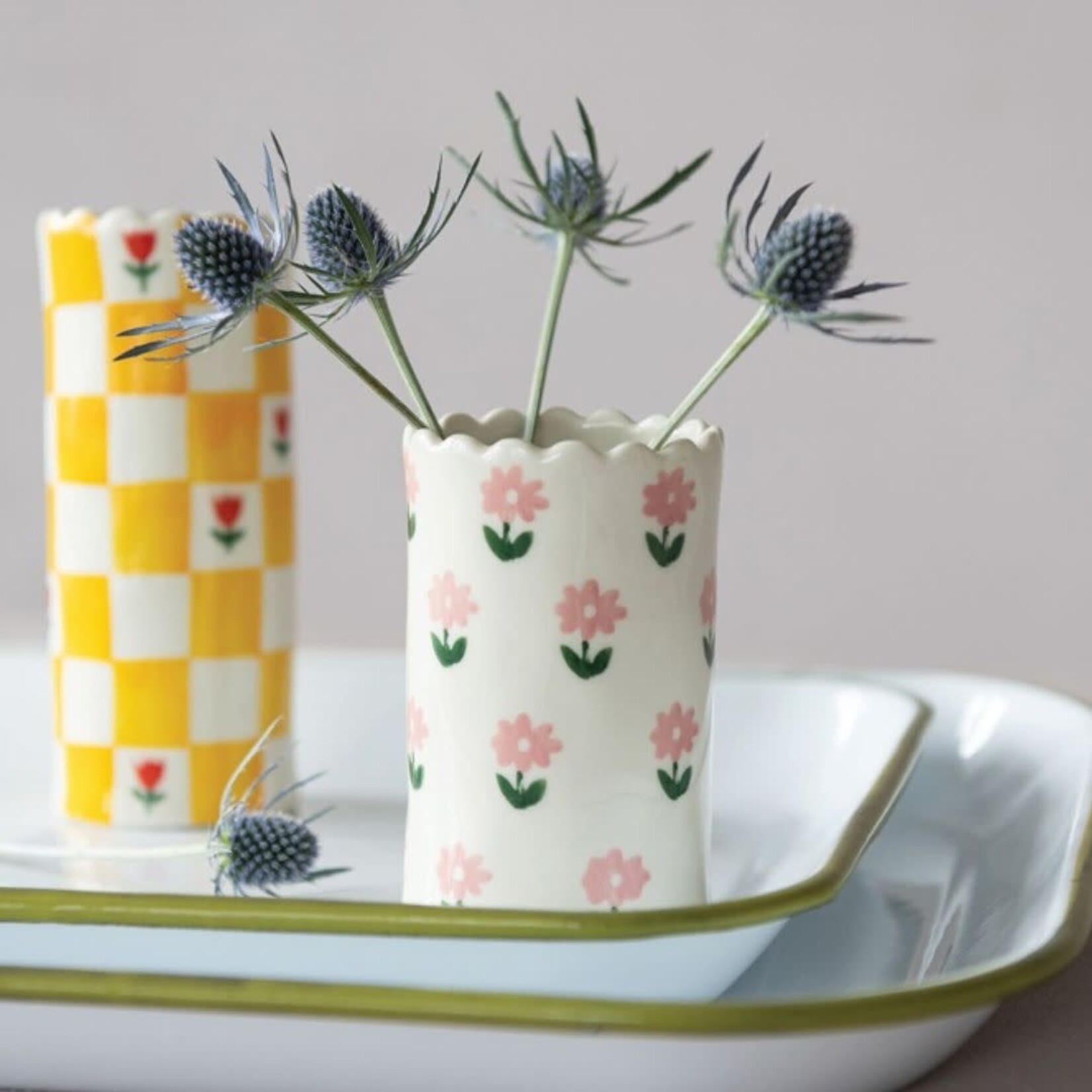 cream stoneware vase with pink flowers and scallop