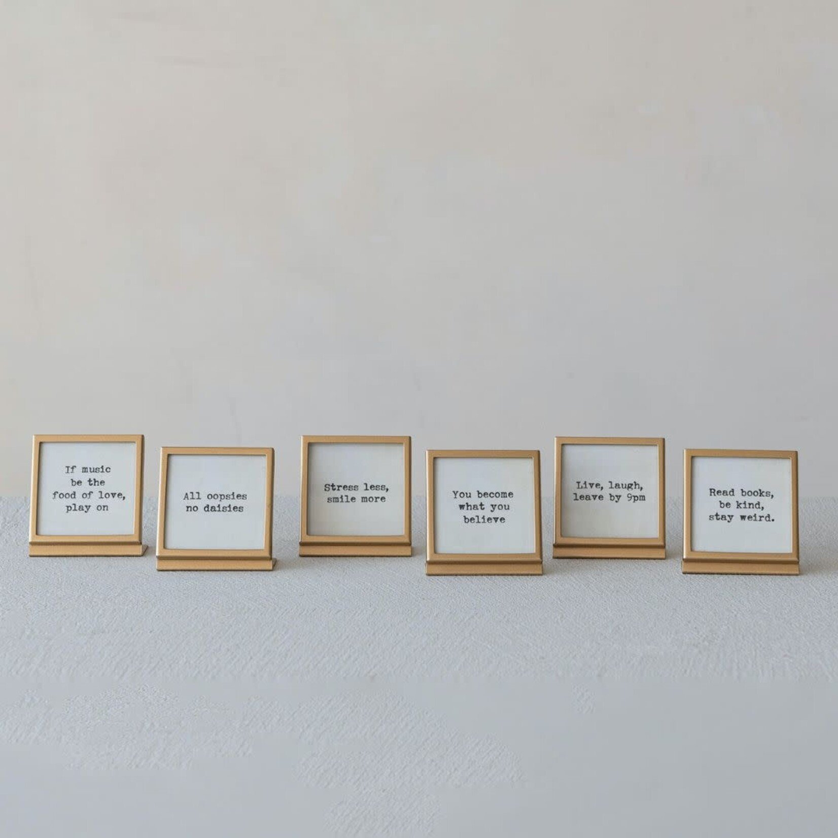 m. lynne designs gold metal frame with typed quote