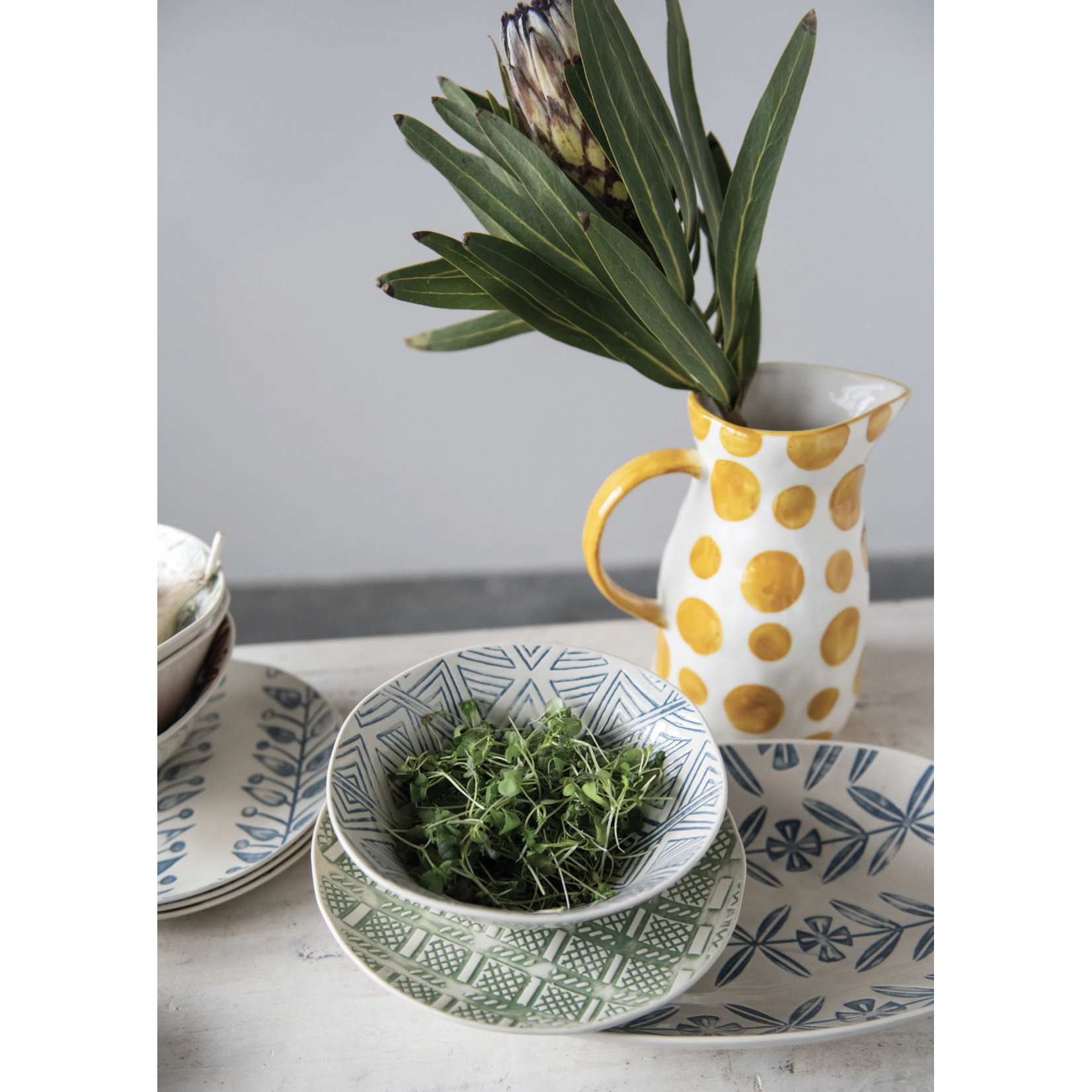 m. lynne designs yellow polka dot stoneware pitcher