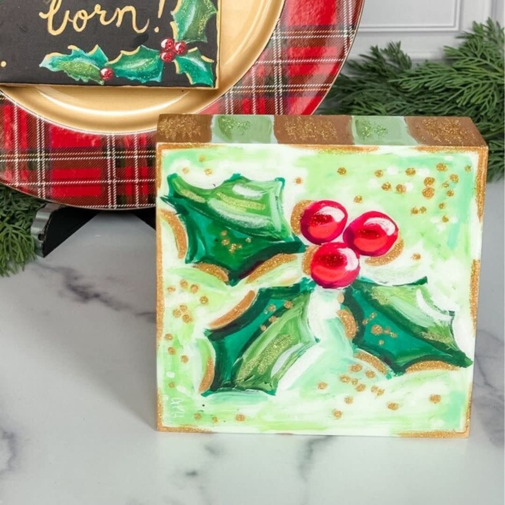 the round top collection resin holly bough canvas