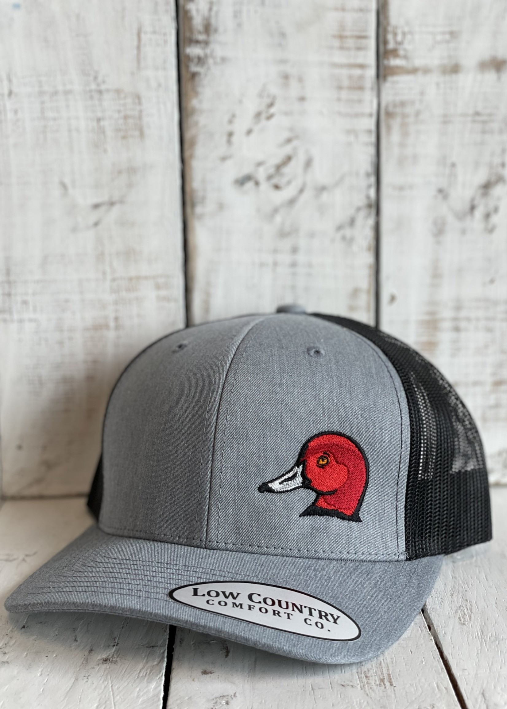 Trucker Hat Ruffling Feathers Redhead