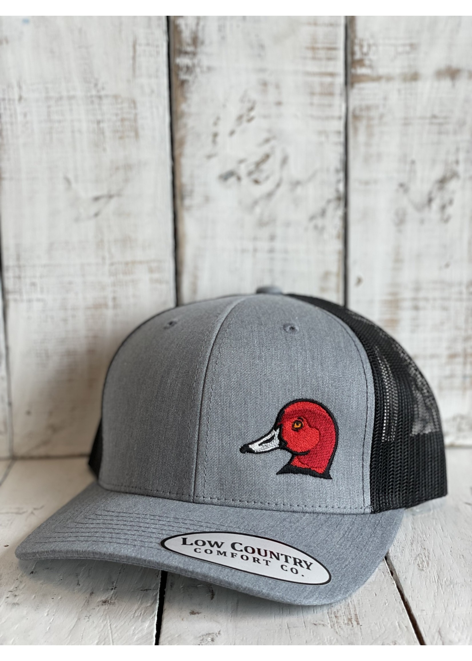 Low Country Trucker Hat Ruffling Feathers Redhead