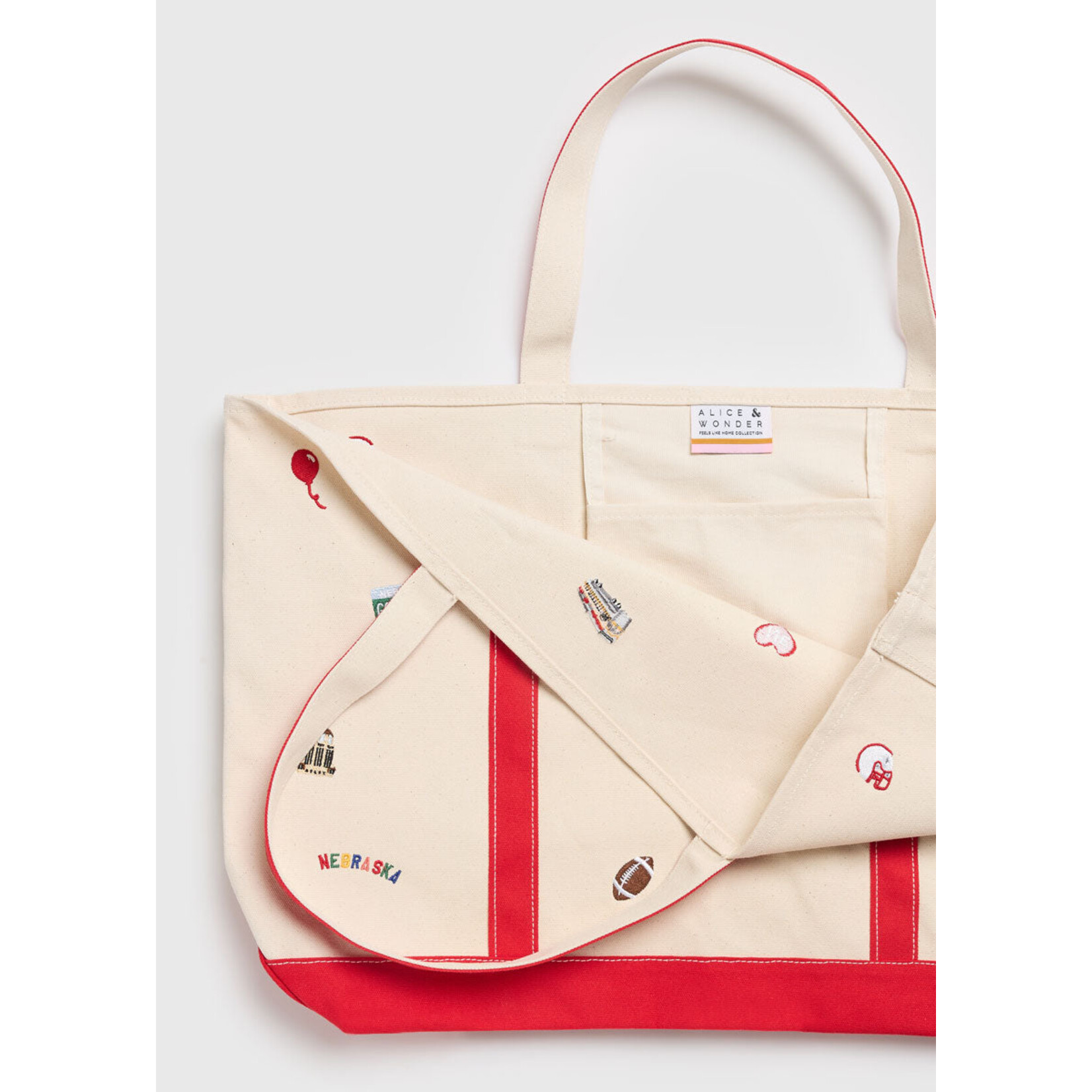 alice & wonder nebraska tote bag