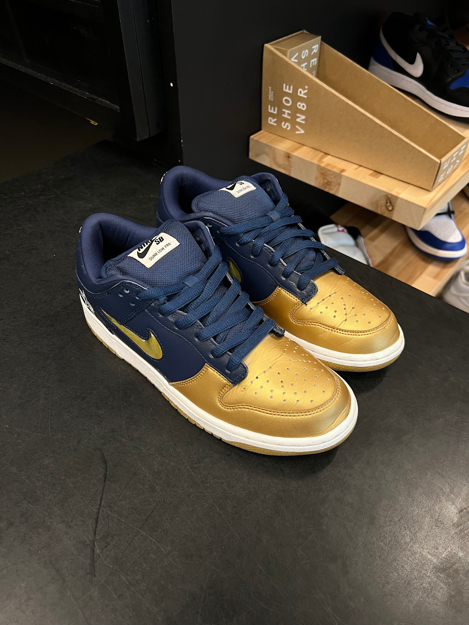 nike sb gold swoosh