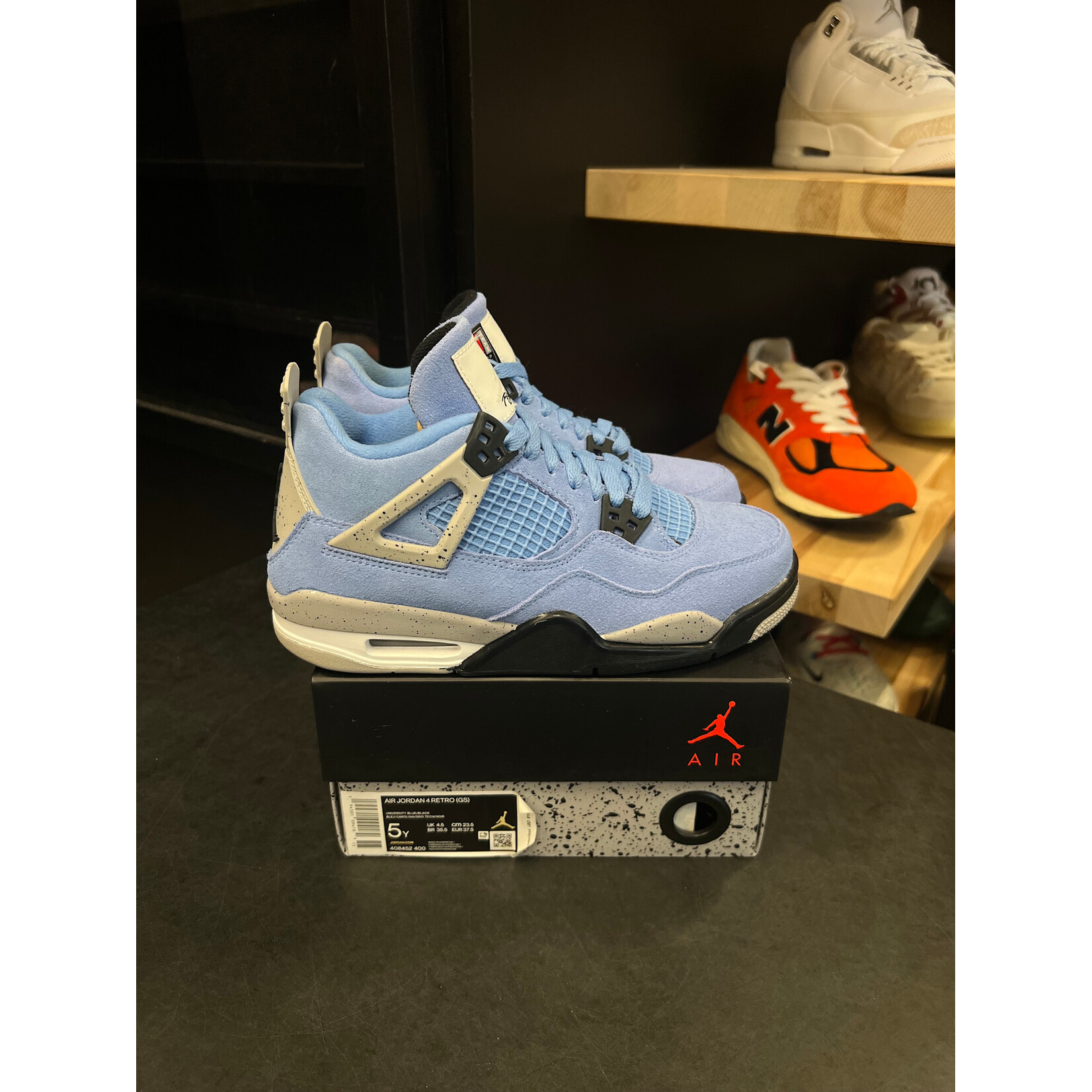 Jordan Jordan 4 Retro University Blue (GS) Size 5, PREOWNED*