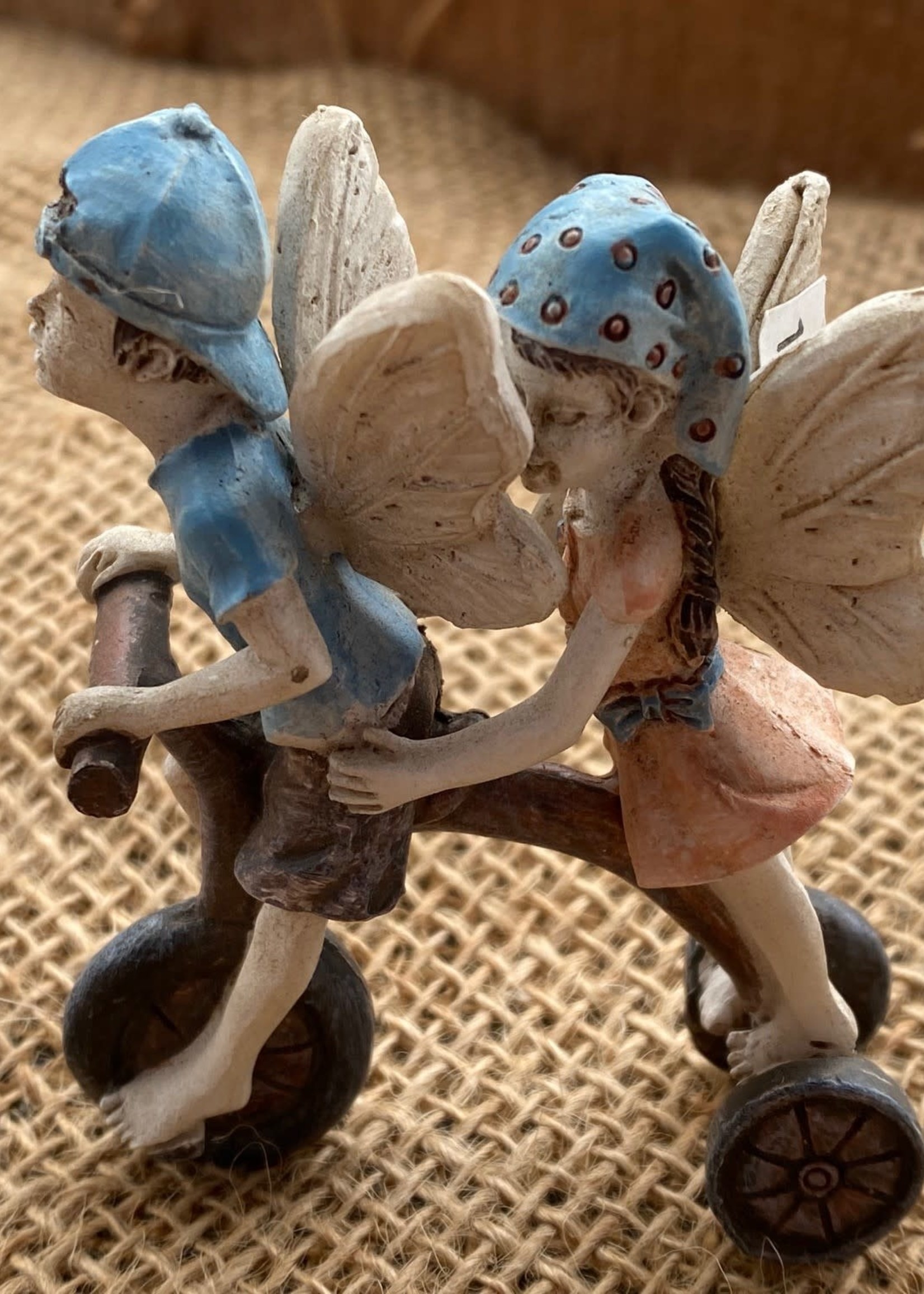Fairies Riding Tricycle