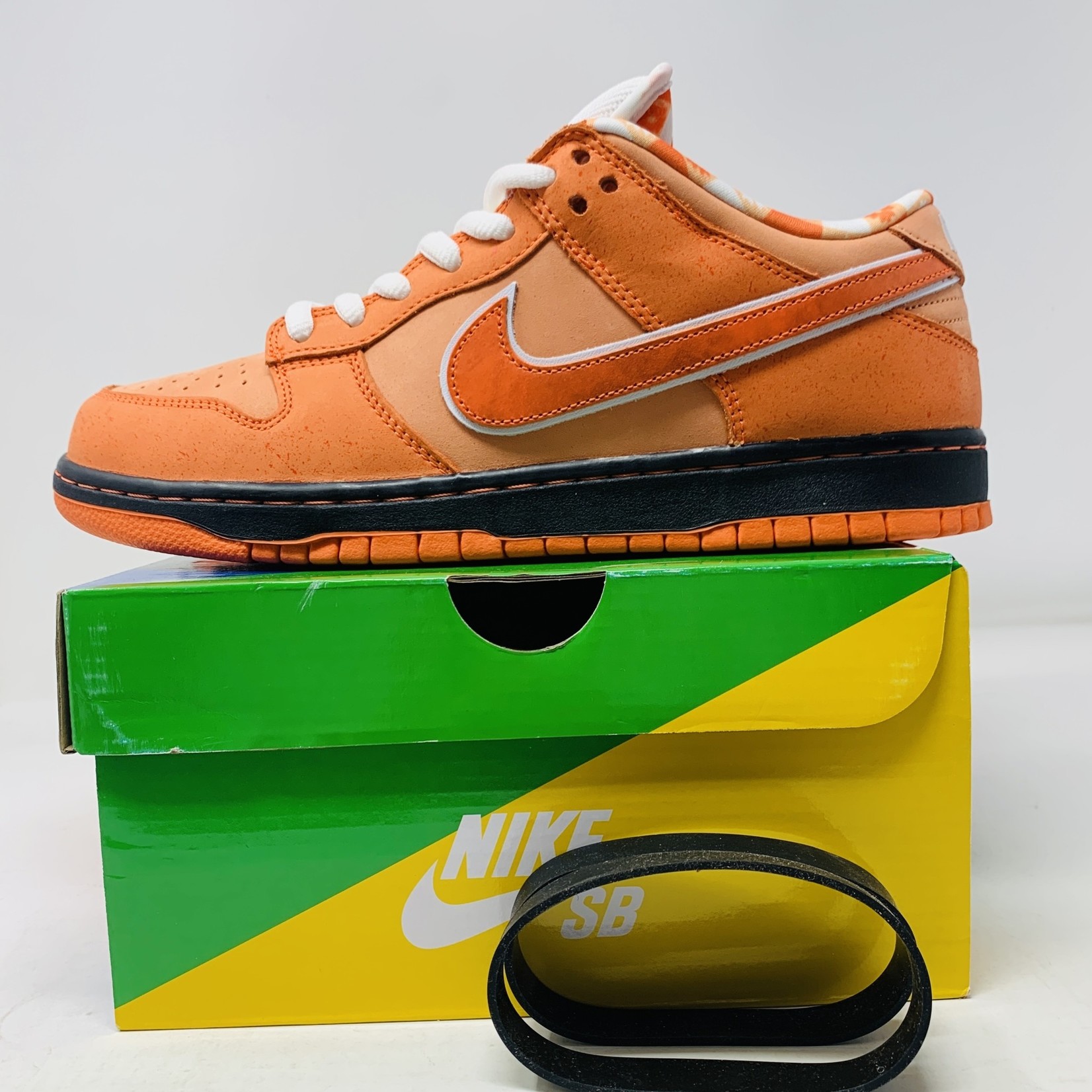 Nike SB Dunk Low Orange Lobster Concepts - Holy Ground Sneaker ...