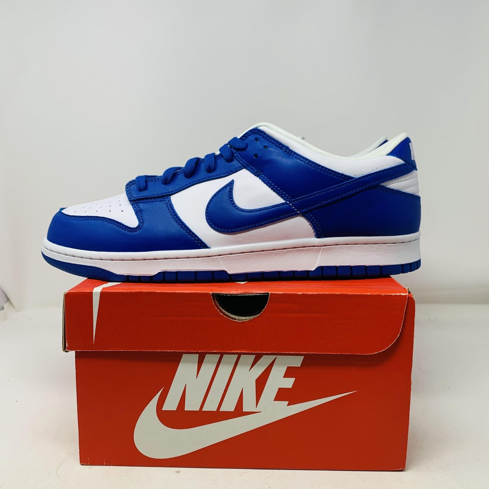 Nike Dunk Low Kentucky - Holy Ground Sneaker Shop - Buy, Sell