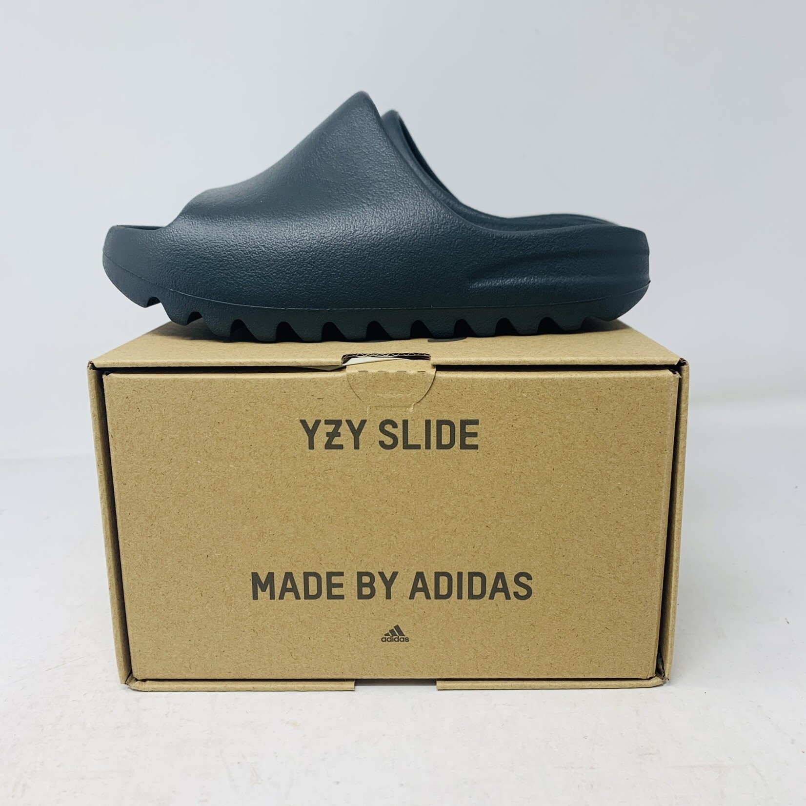 adidas Yeezy Slide Dark Onyx (Kids) - Holy Ground Sneaker Shop 